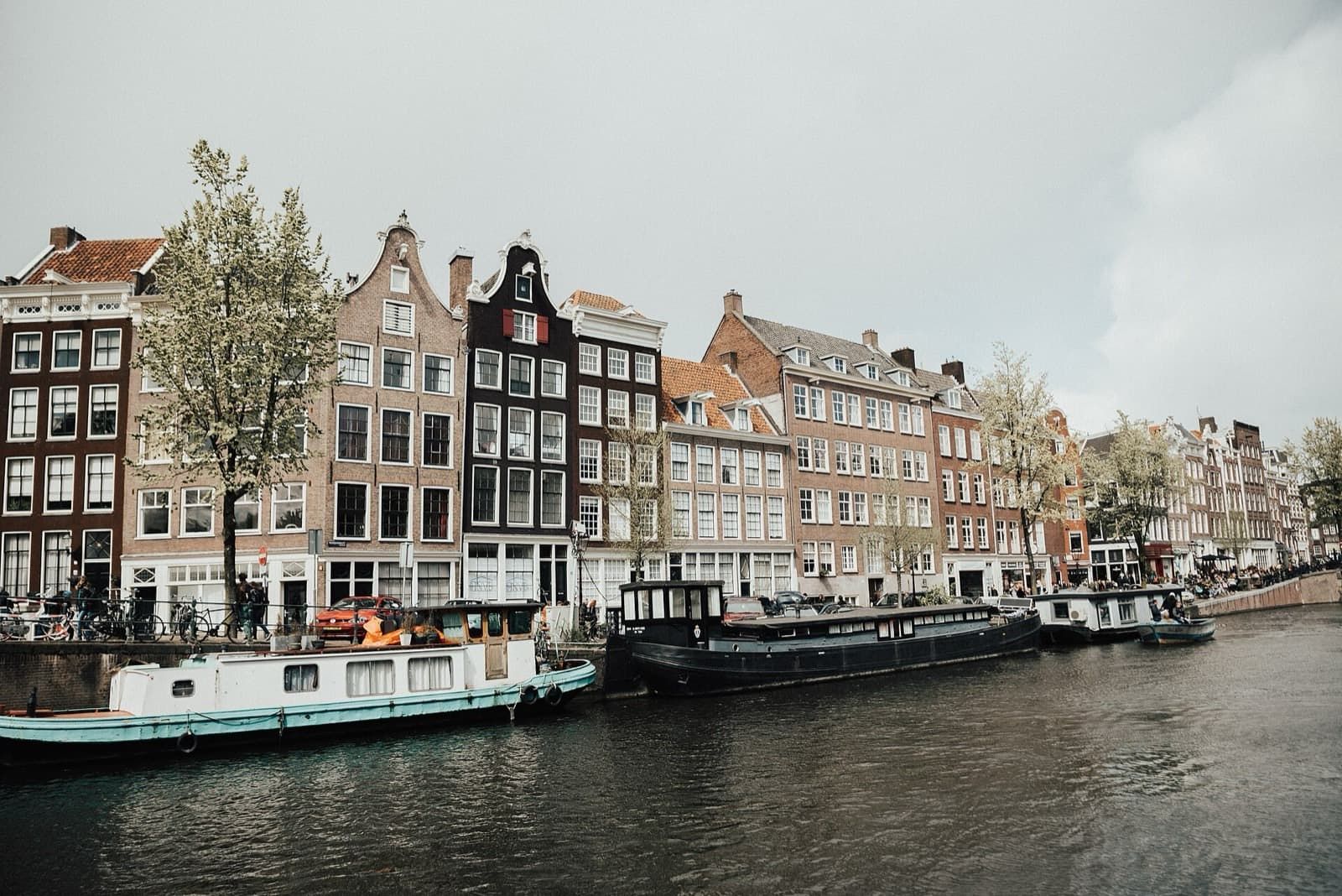 Canal houses and houseboats along an Amsterdam canal